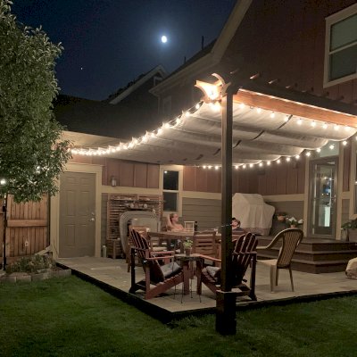 Two-Post Wood Arbor (Options: 12' x 2', Mosaic Redwood, No Privacy Panel, 9.5 ft Posts Height, 2-Post Anchor Kit for High-Wind, Transparent Premium Sealant). Retractable Shade Canopy was purchased from Infinity Canopy of Los Angeles, CA, www.infinitycanopy.com. Photo Courtesy of D. Kasper of Denver, Colorado. 