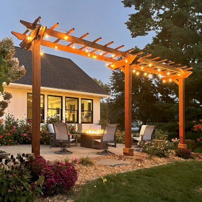 Custom 3-Post Wood Arbor (Options: 22' x 4', California Redwood, 10 ft H, 3 High-Wind Anchor Kit, 6x6 Posts, 2x8 Supports, 2x6 Rafters, Electrical Trim Kit for 1 Post, Transparent Premium Sealant). Photo Courtesy of N. Oppedahl of Frontenac, MN.