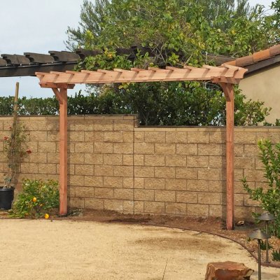 Two-Post Wood Arbor (Options: 12' x 3', California Redwood, No Privacy Panel, 10 ft Posts Height, 2-Post Embedded in Concrete, Unfinished). Photo Courtesy of Joseph Zappala of Newport Coast, CA.