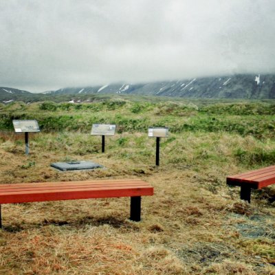 VA Wooden Bench at Alaska Maritime National Wildlife Refuge (Options: 6 ft, Mature Redwood, Extra Long Legs, No Cushion, No Engraving, Transparent Premium Sealant). This photo is at the battle ground site of the WWII battle at Attu Island and is part of the memorial to the dead from that battle with the Japanese on american soil.