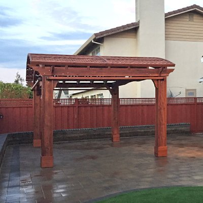 Custom Viking Pergola DIY Kits (Options: 14' L x 20' W, Mature Redwood, Extra Thick Lumber, 3 Curtain Rods, 4-Post Anchor Kit for Concrete, Transparent Premium Sealant). Photo Courtesy of R. Huckaby of Foster City, CA. 
