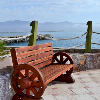 Wagon Wheel Wooden Bench (Options. 5 ft, Old-Growth Redwood, No Cushion, No Engraving, Transparent Premium Sealant). 