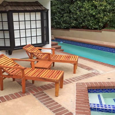 Wood Pool Lounger (Options: Single, Standard 74", Redwood, 18" H, Transparent Premium Sealant) with a Sturdy Rectangular Wood Side Table. Photo Courtesy of B. Hohl of Newport Beach, CA.