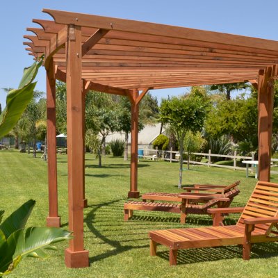 Wood Pool Lounger (Options: Single, Standard 74", Redwood, 13" H, Include Wooden Wheels, Transparent Premium Sealant). La grange style armrests & 54" L bed by custom request. Photo also shows The Fan Pergola