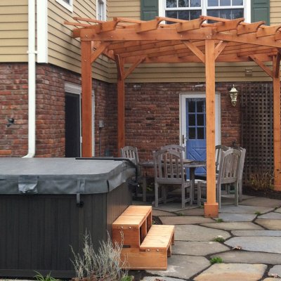 Wooden Spa Step (Options: 48" x 22" x 18H", Redwood, No Engraving, Transparent Premium Sealant). Photo Shows Custom Pergola in Background. Photo courtesy of Deborah Pasik of Morrisontown, New Jersey.